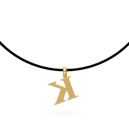 Geltono aukso kaklo papuošalas su raide K ir deimantais